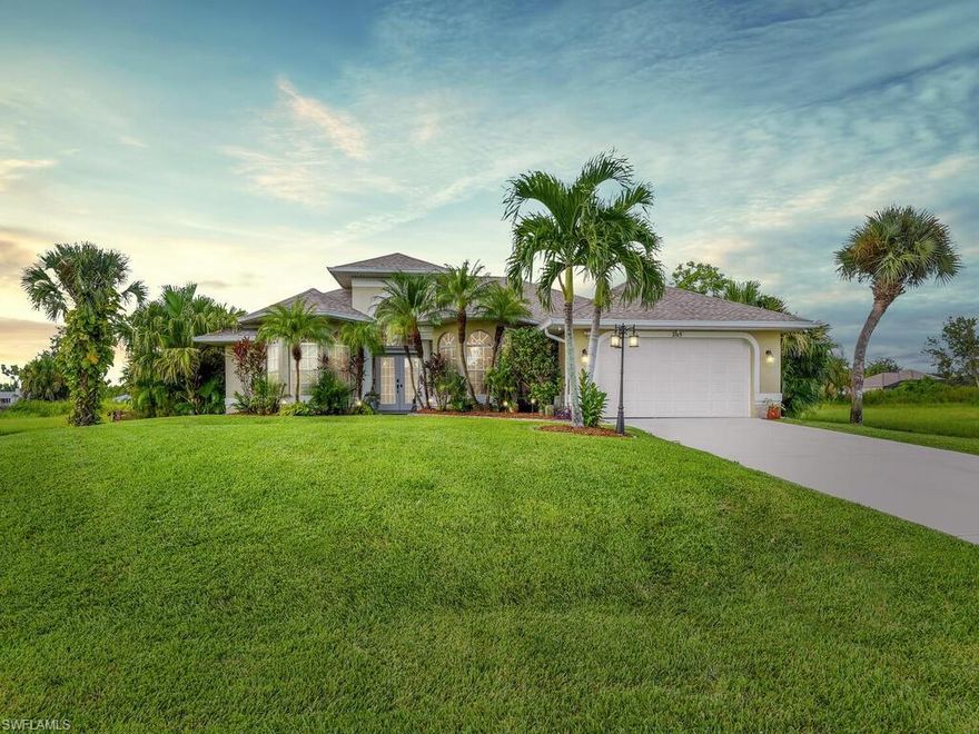 CUSTOM FEATURES THROUGHOUT! This waterfront pool home has been updated with unique woodwork, NEW ROOF (2/23), NEW A/C (2023), NEW TANKLESS HOT WATER HEATER (2023), new pool pump & filter (2023), a/c in garage installed in 2021, new well pressure pump, custom French doors to den/home office, custom built book shelf that hide Murphy bed in den/home office, tongue & groove ceiling on pool lanai, high-end light fixtures & fans, custom shelving in laundry room, new wood flooring, tropical landscaping additions w/ fruit trees, lighting, & more! Situated on a freshwater canal & offering a great room layout, split bedroom floor plan, cathedral ceiling, kitchen w/ granite countertops, cathedral ceiling, lots of natural lighting, master suite w/ sliders to lanai, spa-like master bath, private guest wing w/ full bath that has entryway to pool lanai, & a full size 2-car garage. You will LOVE the outdoor living space that this home has to offer- peaceful water view, screened rear lanai w/ pool & spa, open lanai (perfect for grill area) & private dock. Very convenient location- close to lots of shopping/dining options, easy access to Fort Myers, short drive to public golf course & boat ramp.