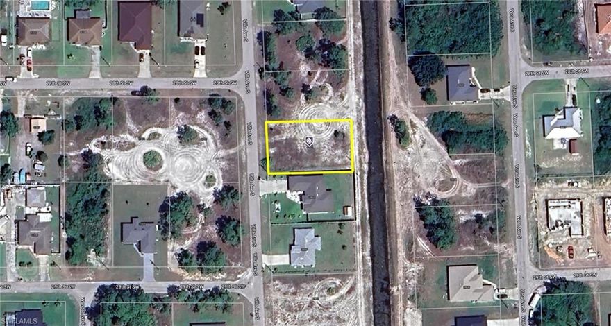 Transform your ideal home into a reality with this exceptional lot! Offering ample space, it provides the perfect canvas for crafting a residence tailored to your unique lifestyle and preferences. Canal on the rear of the property. Whether you imagine a spacious family home, a contemporary architectural masterpiece, or a tranquil retreat, the possibilities are limitless on this property. Lehigh Acres is currently experiencing rapid growth and development, presenting a favorable moment to invest in real estate in this flourishing area. Whether you aim to build your forever home or view it as a strategic investment, this lot boasts promising long-term potential. Seize the opportunity to secure this prime residential lot in Lehigh Acres and turn your vision into reality by creating the home you've always dreamed of owning.