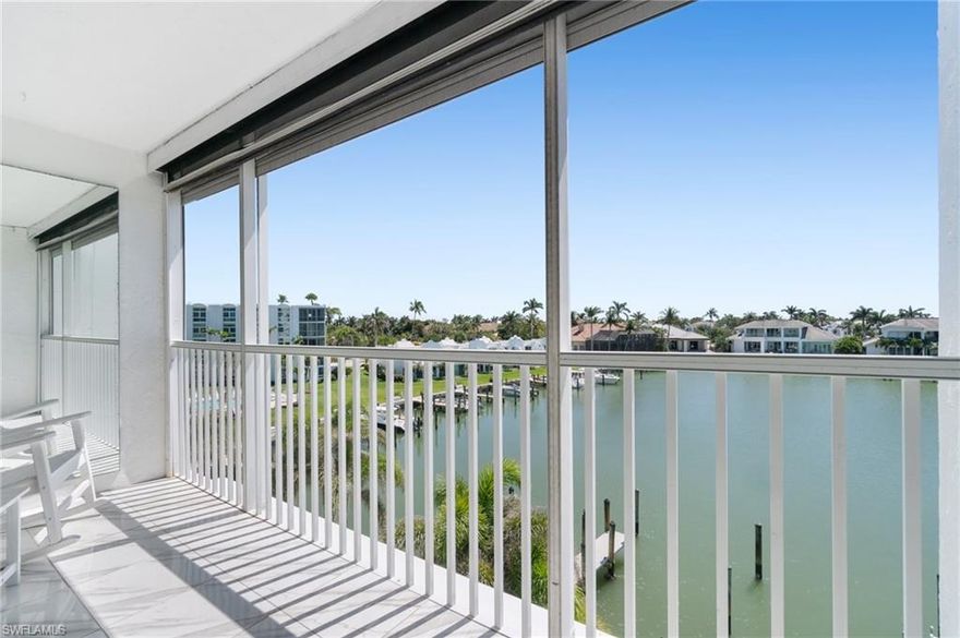 RENOVATED 4th-floor BAYFRONT CONDO with spectacular SOUTH-FACING WATER VIEWS, for BREATHTAKING SUNRISES and SUNSETS! Perfect location a SHORT 8-MINUTE WALK to the PARK SHORE PRIVATE BEACH PARK and a 3-MINUTE WALK to the SHOPS/DINING AT VENETIAN VILLAGE! GULF-ACCESS BOAT SLIPS may be available for lease right in your backyard (subject to availability and negotiation with current lessee)! Nestled in a desirable, PET-FRIENDLY (25 lb limit) building, this beautifully renovated condo features modernized kitchen & bathrooms, NEW white oak look luxury vinyl plank floors throughout, plantation shutters & both electric hurricane shutters & screens, so you can enjoy your spectacular bay view either open air or screened in! The PRIME LOCATION offers an easy stroll to The Village Shops on Venetian Bay with top dining, shopping, and entertainment while being just 3 miles from DOWNTOWN NAPLES. Enjoy PRIVATE BEACH PARK access (1/2 mile away - optional annual membership fee), perfect for a leisurely walk to the sand and surf. The BAYFRONT POOL with Bar and Grill Area, Kayak Storage (12 on a Space Available Basis), Covered Parking, Storage Locker, and Boat Slips (available for lease, subject to availability) add to the exceptional lifestyle this residence offers. The unit also features a full-size washer & dryer. PELICAN POINT is an intimate, well-maintained, 36-unit building with an on-site manager. Don’t miss this rare opportunity to own a piece of paradise!