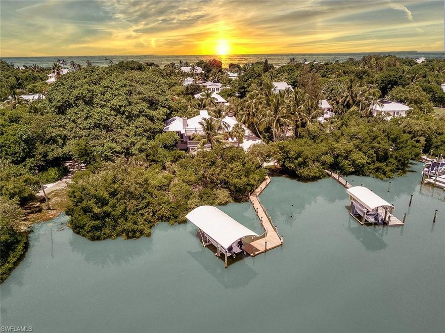 H.16166 - A rare opportunity to own a Gulf-to-Bay home on Captiva’s premier Tween Waters’ stretch. This unique multi-home property offers the best of #CaptivaLifestyle with private beach, deep water dock with covered boat lift on the bay with direct gulf access, a private and fenced in pool/spa, multiple outdoor showers, and kayak/SUP launch. From your dock on Roosevelt Channel, explore legendary Pine Island Sound cruising, mangrove kayak trails, and world class birding. Spectacular sunrise/sunsets on your private gulf front beach. Main house “Channel Chop" is a tasteful oasis set among palm trees and Captiva breezes with open floor plan, high ceiling, ample deck, covered lanai, and crow’s nest for entertaining or spotting manatees. “Sister Shack”, built in 2006, offers 3 bedrooms, 2 bathrooms, covered lanai, beautiful tile flooring, many additional sleeping areas, oversized vehicle garage, and much more. A Glacier Bay boat, kayaks, paddle-boards, and a street legal golf cart convey with sale. Property zoned Multi-Family. Come experience your ideal extended-family getaway, rental property or private paradise escape.