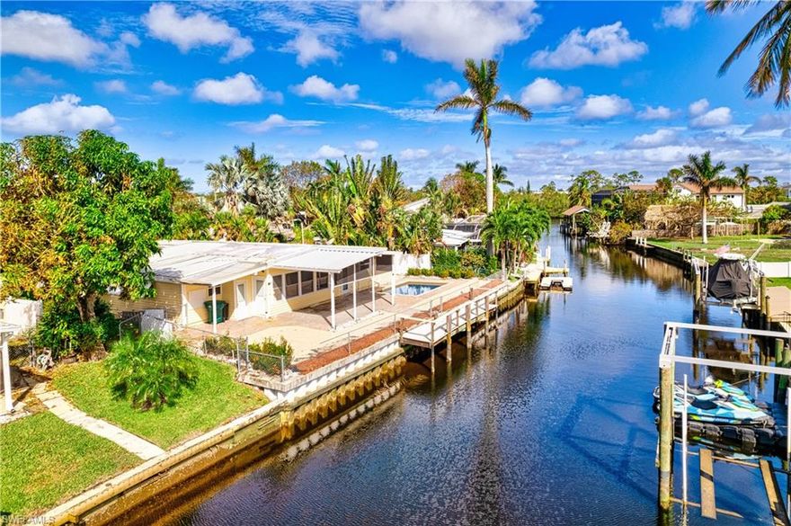 The best deal on the market just got even better! Another huge price improvement for quick sale. Just 1 mile to Downtown and the Beach. Current owner mitigated the hurricane damage. Buyer now has a clean palette to continue remodeling this beautiful pool home or rebuild. There is magic happening inside and surrounding the historic Naples boating community of Brookside. When you arrive, you will see some magnificent custom gulf access estates lining the riverfront. On the canals, you see the beginning stages of multi-million dollar construction, mixed with remodeled mid-century waterfront homes. The commercial land surrounding Brookside should be vastly different soon. The Gateway Triangle redevelopment, including the highly anticipated 2023 arrivals of Metropolitan Naples, Ellington, and the 7-acre redevelopment of the Brookside Marina, are a trifecta of game changers on Brookside's doorsteps. Brookside is coming into the limelight with the convenience of living on the water close to it all. NO HOA or rental restrictions. Property being sold as-is.