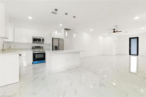 Photo of 2803 E 13th ST, LEHIGH ACRES, FL 33972 (MLS # 226017967)