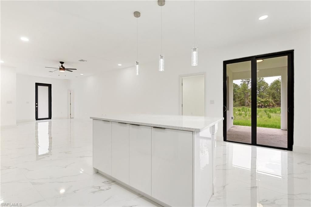 Photo of 2803 E 13th ST, LEHIGH ACRES, FL 33972 (MLS # 226017967)