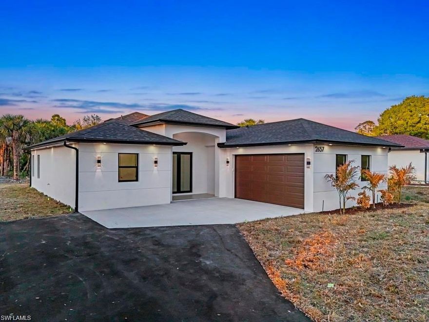 Be the first to live in this brand new construction home in Golden Gate Estates. This 3-bedroom plus den residence sits on 1.14 acres uplands with no HOA, offering space, privacy, and flexibility. The open-concept layout features modern finishes throughout, including quartz countertops, custom cabinetry, a waterfall peninsula, stainless steel appliances, and a spacious pantry.

Ceiling fans are being added to the lanai, window coverings are being installed and washer and dryer will be installed after lease execution. 

Additional highlights include impact windows and doors, a tankless water heater, epoxy garage flooring, LED mirrors, and an automated sprinkler system. The property has been professionally cleared and landscaped.

Conveniently located in Golden Gate Estates with easy access to Naples amenities, shopping, dining, and major roadways. Available for immediate occupancy upon approval.