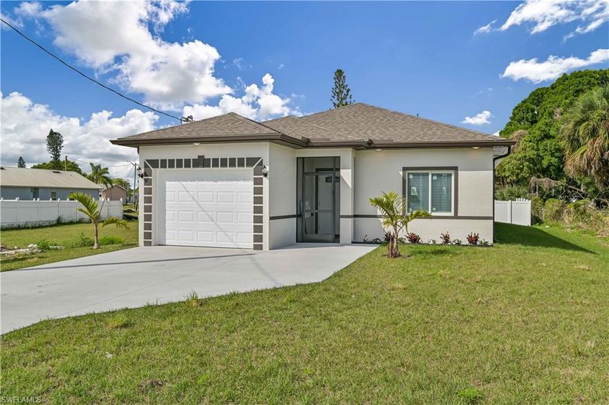 New construction on oversized lot ready in February. Over 9ft ceilings, and beautiful tile throughout. Impact doors and windows in this 3 br 2 bath house that is almost ready for a family. Come check it out today, this location is prefect and close to everything that you will need all restruants and all types of entertainment. Pictures are of a different property, but the house is the same model. Colors and some items may be different. Updated pictures coming soon.