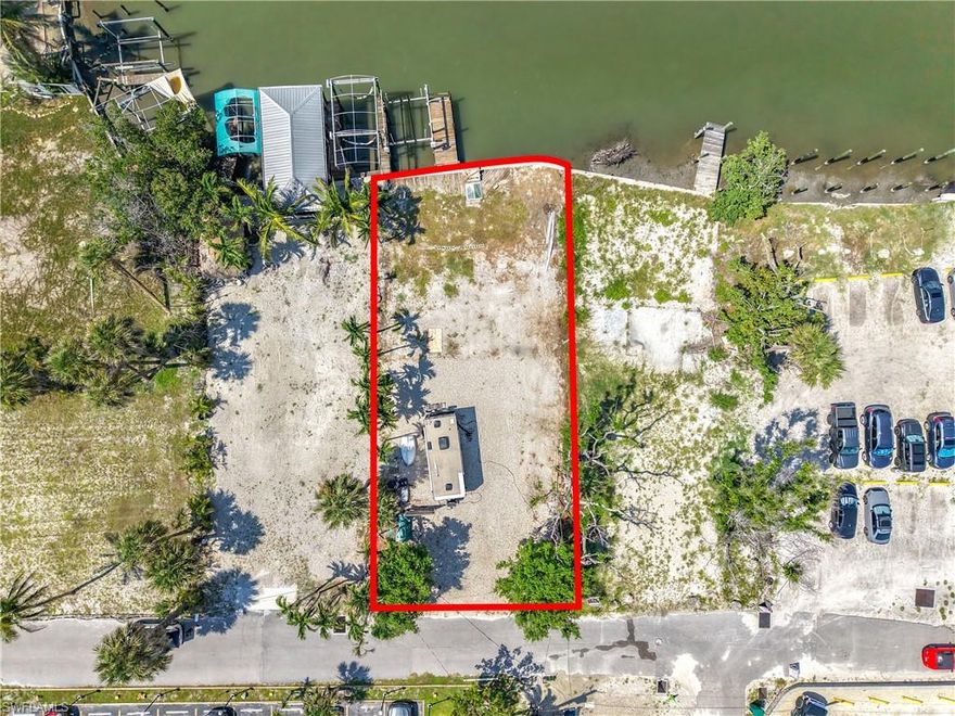 INVESTORS LOOK NO FURTHER! This waterfront lot is located in the unique Santos Zoning district, which means you have multiple options at your fingertips (please request the Zoning Verification Letter or if you're an agent the ZVL is on the MLS). From a water taxi, to an office, duplex, bed and breakfast, a single family home and/or more. No matter what you decide to do you will make money with this property! Also, potential for very high rental income since this property is in the WEEKLY RENTAL DISTRICT and walking distance to the beach, dining, shopping and Time Square!