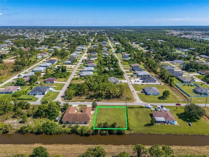 Don’t miss this prime residential lot offering flexibility for a single-family home or duplex. Enjoy the peaceful backdrop of a canal-front setting, providing extra privacy and a natural view. Conveniently located near Gateway, with easy access to I-75, SWFL International Airport, and nearby dining and shopping centers. Ideal for investors or first-time home buyers looking to build, live on one side and rent the other. Opportunities like this are rare—secure your piece of Lehigh Acres today!