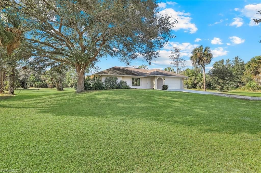 Photo of 711 21st ST SW, NAPLES, FL 34117 (MLS # 225083675)