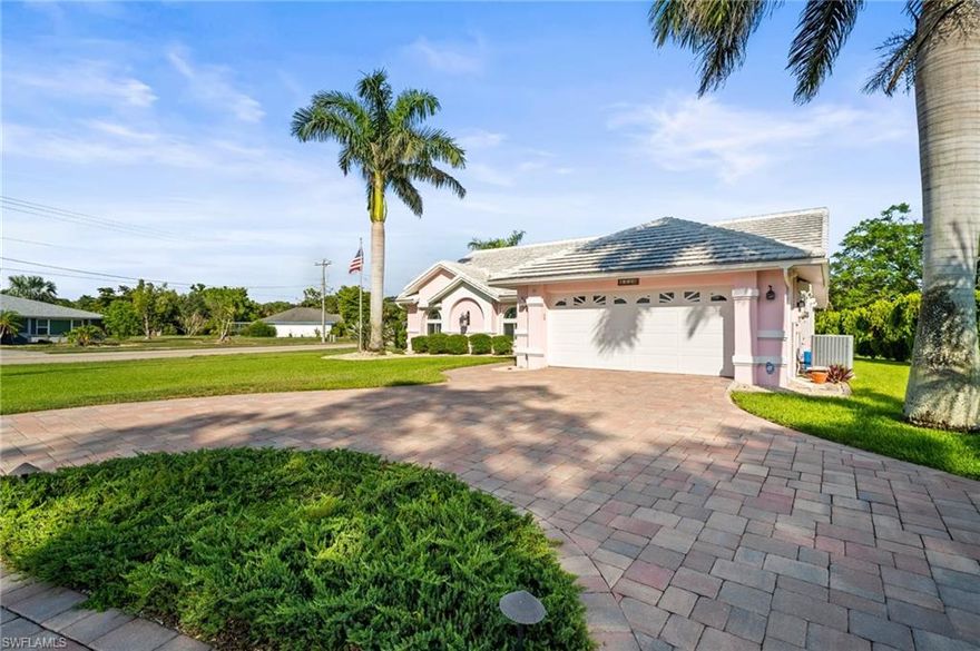 This beautiful one of a kind home in highly sought after Lochmoor needs nothing. The home was not flooded in Hurricanes Ian, Helene, or Milton. NO HOA fees! NO restrictions on rental income! It has newer appliances, new decking around the pool, new pool cage with custom lighting in 2023. Inside the home you'll find a large living area for entertaining with a cathedral ceiling for that plenty of room, yet warm feeling. The superb split floor plan is laid out where the 2nd and 3rd bedroom area closes off separately for the privacy and comfort of your guests. The pool bath is well designed where your guests will never have to walk through the house to take their needed breaks. Additional features are electric hurricane shutters, pre-wired entertainment system, custom blinds throughout the home, alarm with outdoor cameras and recorder, heater for the salt water pool, double pane windows, energy efficient heat pump hot water heater, water softener, and generator hookup. Friendly neighbors and located about 10 minutes from DT Fort Myers and 15 minutes from DT Cape Coral too! Don't miss out! Ask to see this home today.