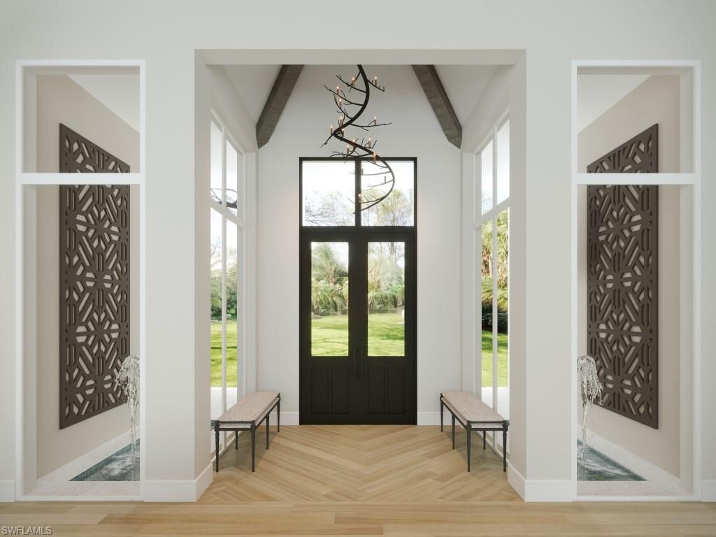 Photo of 465 Gordonia RD, NAPLES, FL 34108 (MLS # 226013192)