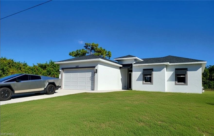 Seller will credit $10,000 concessions towards buyer's closing costs. *** WATERFRONT HOME ON CANAL ***  EXTRA WIDE VIEW IN BACKYARD COMPARED TO MOST HOMES IN THE NEIGHBORHOOD !! Comes with Buyer Warranty and Home is covered by a TEN-YEAR insurance backed structural warranty
 from 2-10 Home Buyers Warranty.! **Stunning Modern Home with tens of thousands in upgrades**! Welcome to luxury living in this
 meticulously designed modern home nestled in the heart of Buckingham Fort Myers. Step into elegance with pristine white polished floors that
 exude sophistication and charm throughout the home. - **Designer Kitchen Elements:** The gourmet kitchen features beautiful quartz
 countertops, designer cabinetry, and top-of-the-line appliances, creating a perfect blend of style and functionality. - **Huge covered Patio with
 Lights:** Entertain guests or unwind in style on the spacious covered patio, illuminated by enchanting lights, offering a seamless indoor
outdoor living experience. - **Luxurious Master en-suite:** Retreat to the opulent master bedroom featuring a luxurious en-suite bathroom
 complete with a gorgeous freestanding tub, huge shower, and premium fixtures, providing a sanctuary of relaxation. - Enhancing both
 aesthetics and functionality, decorative shutters, impact windows and doors add a touch of elegance while providing security and peace of mind.- **Prime Location:** Enjoy the convenience of an amazing location offering easy access to amenities, shopping, dining, and entertainment
 options. - **Finest Materials Used:** Every detail of this home reflects quality craftsmanship and attention to detail, with the finest materials
 used throughout to ensure lasting beauty and durability. This exceptional residence offers the epitome of luxury living, combining modern
 elegance with comfort and convenience. Don't miss the opportunity to make this dream home yours. This home has characteristics of a million
 dollar home with an amazing price! Some photos of the furniture in this listing have been virtually
 rendered.