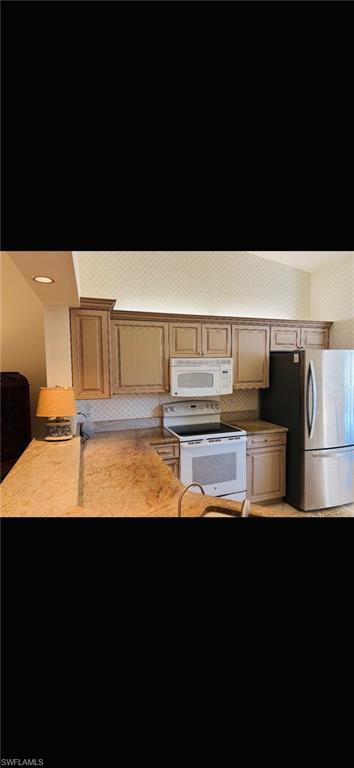 LAUREL OAKS AT PELICAN BAY - Residential