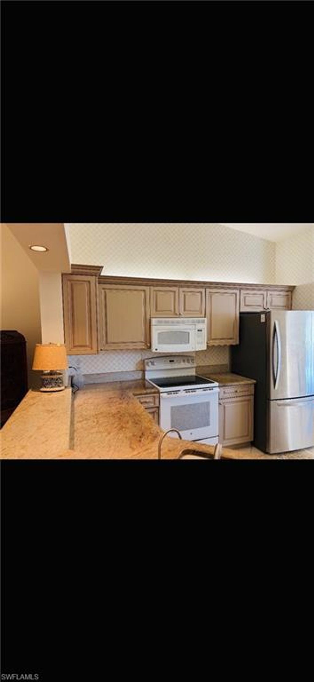 Photo of 841 Tanbark DR #201, NAPLES, FL 34108 (MLS # 226002340)