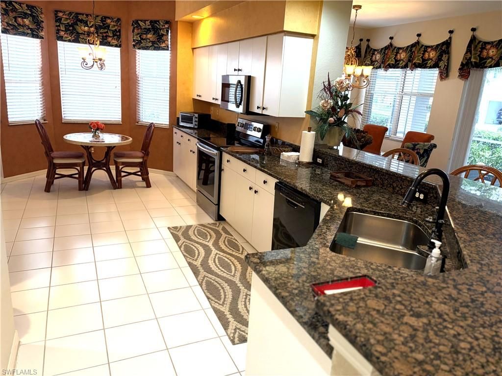 Photo of 25576 Lake Ameila Way WAY #101, BONITA SPRINGS, FL 34134 (MLS # 225083203)