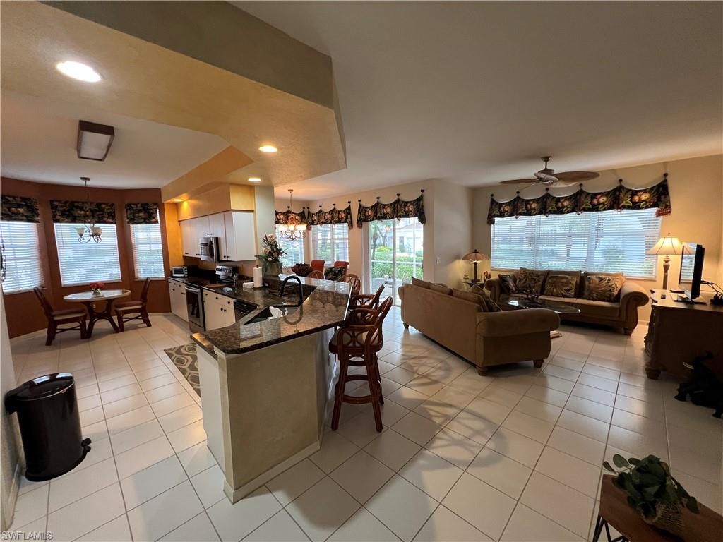 Photo of 25576 Lake Ameila Way WAY #101, BONITA SPRINGS, FL 34134 (MLS # 225083203)