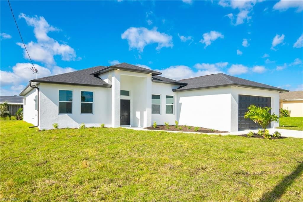 Photo of 522 NW 1st LN, CAPE CORAL, FL 33993 (MLS # 226021236)