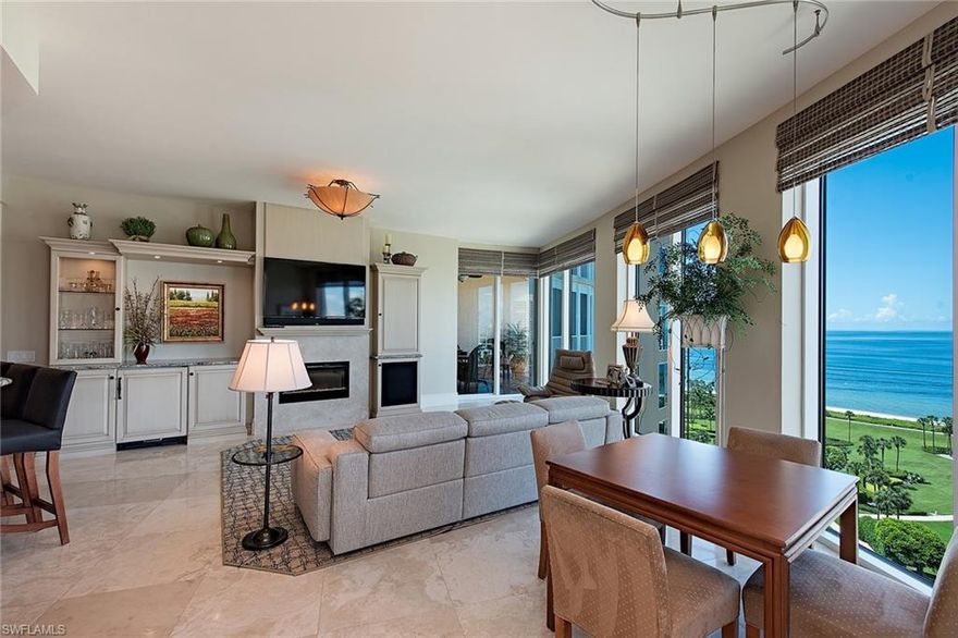 Enjoy wide-ranging vistas from this perfectly located 12th floor Aria gem. Ten-foot window walls of glass overlook the beach and Gulf waters and take in breathtaking views of the Venetian Bay and mesmerizing city lights all the way up the coastline to Captiva Island! Creamy marble floors and sophisticated soft interiors by Janet Bilotti are the perfect backdrop for the spacious interiors. Thoughtful modifications created an expanded family room and the numerous additional custom features include built-in storage and cabinetry throughout the residence, a built-in Murphy bed in the third bedroom/office, a SONOS sound system, Lutron lighting and electrically operated window treatments. Also included are two screened and shuttered terraces and a rare private two car garage. Aria is a high-end luxury building with the finest amenities and is pet-friendly (2 household pets any size).