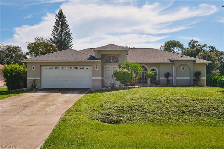 PRICE IMPROVEMENT!!Great location in Buckingham Park! This 3 bedroom, 2 bath split floorplan home is in one of the most convenient spots in the community—just the second house off Buckingham Rd for easy access in and out. Unlike most homes in the neighborhood, this one has no neighbors directly behind it, and across the street you’ll find extra open space for added privacy. Inside you’ll find a very functional layout with vaulted ceilings, a family room, and a breakfast bar off the kitchen. The second bath is set up as a pool bath, and the yard has more than enough room to add a pool. A screened lanai gives you a nice spot to enjoy the outdoors. Big-ticket updates are already done: new roof in 2020 and a new water system in 2024. Buckingham Park is one of the area’s most desirable neighborhoods—lots of families, plenty of kids, and many local law enforcement officers who call it home, making it feel safe and welcoming. . It’s close enough to town for convenience but far enough out for some peace and quiet. PLEASE DO NOT TOUCH REPTILE CAGES ON LANAI