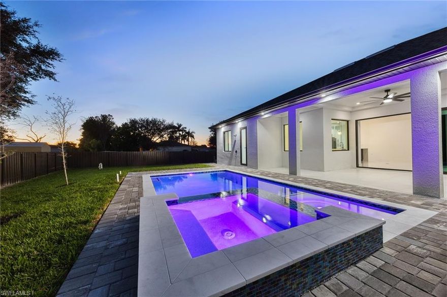 Triple Lot New Construction Home in Northwest Cape Coral. Seller is willing to offer buyer concessions toward closing costs, making this an excellent opportunity to reduce upfront expenses and maximize affordability.

Welcome to 108 NW 29th St, Cape Coral, FL 33993, a fully finished new construction home situated on a rare oversized triple lot in one of Northwest Cape Coral’s fastest growing residential areas. This property offers exceptional space, privacy, and modern design, making it ideal for buyers searching for a luxury home with land in Cape Coral.

This single family residence features 3 bedrooms plus a den, 3 full bathrooms, and 1,735 square feet of open concept living space. The great room layout showcases coffered ceilings, built in cabinetry, and tile flooring throughout for a clean, modern, and low maintenance lifestyle. The kitchen is designed for both functionality and entertaining, offering a large island, pantry, wall oven, electric cooktop, and contemporary finishes.
The spacious primary suite provides a private retreat with dual sinks, a walk in closet, and a spa style shower. A split bedroom floor plan ensures privacy for guests and family, while the den offers flexibility as a home office, study, or additional living space.

Step outside to an expansive 0.35 acre fenced triple lot, a standout feature rarely available in Cape Coral. The backyard is designed for outdoor living and entertaining and includes a heated pool and spa, outdoor kitchen, water feature, outdoor shower, and covered lanai with ceiling fans. With three combined lots, there is ample room for future expansion, additional storage, or enhanced outdoor amenities.

This home is built with durability and peace of mind in mind and includes impact resistant windows and doors, a paved circular driveway, and a two car attached garage. Conveniently located near shopping, dining, parks, schools, and major roadways, this property offers easy access to everything Cape Coral and Southwest Florida have to offer while maintaining a quiet residential setting.

If you are searching for a new construction home on a triple lot in Northwest Cape Coral, this property delivers exceptional value, modern comfort, and long term potential.