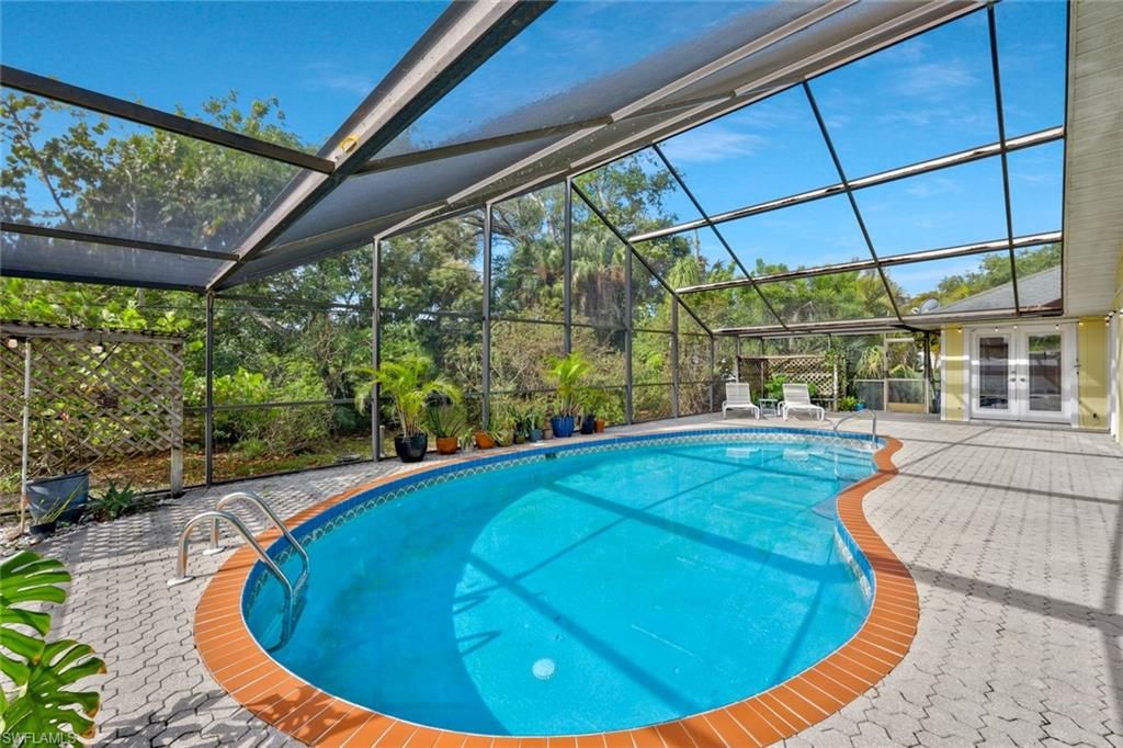 Photo of 10370 Main DR, BONITA SPRINGS, FL 34135 (MLS # 226012147)