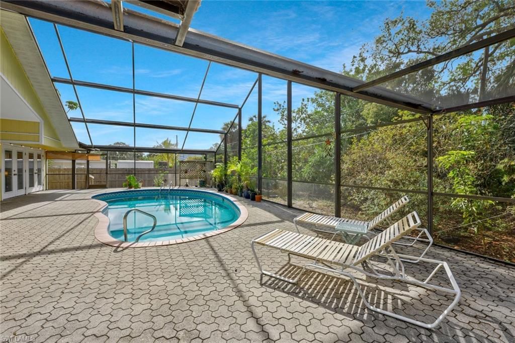 Photo of 10370 Main DR, BONITA SPRINGS, FL 34135 (MLS # 226012147)