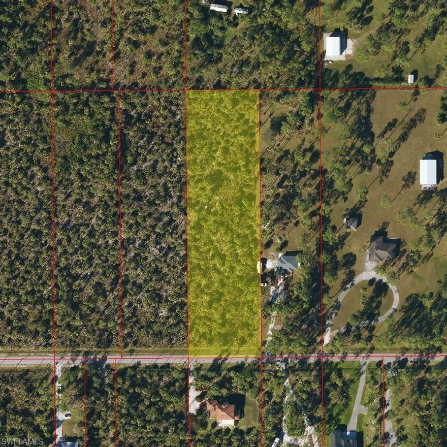 UPLANDS  NICE NEIGHBORING HOMES CLOSE IN OFF OF EVERGLADES THIS 2.73 ACRE LOT IS A RARE UPLAND LOT WON'T LAST