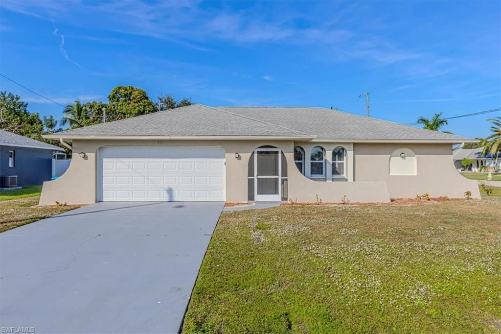 Photo of 713 SE 35th ST, CAPE CORAL, FL 33904 (MLS # 225082661)