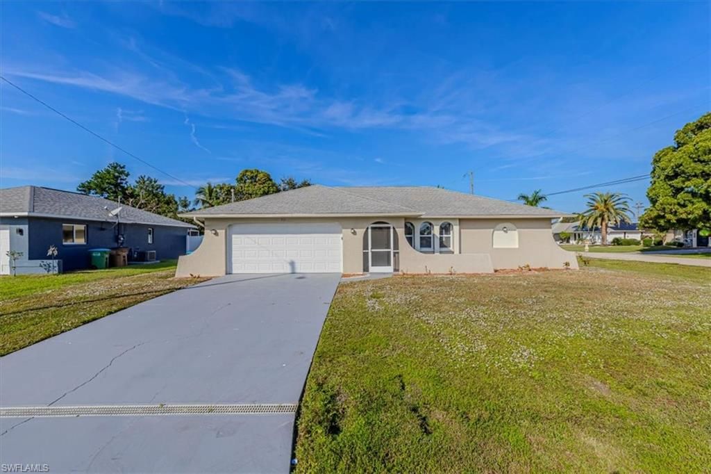 Photo of 713 SE 35th ST, CAPE CORAL, FL 33904 (MLS # 225082661)