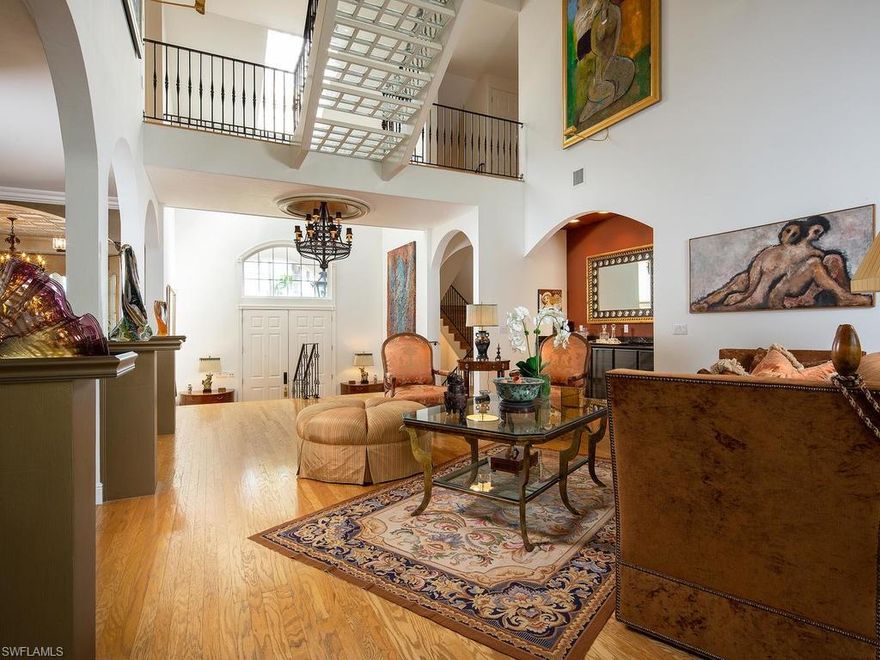 BEST VALUE IN AQUALANE! This southern exposure home has all new Ruffino Cabinetry, large rooms, high ceilings and an open floor plan. Large covered boat slip, heavy duty lift, full length dock and new sea wall. Multiple entertaining areas, open and comfortable spacious living. Full length lanai with built in heating elements and an incredible outdoor space, two gourmet kitchens, six fireplaces, SONOS entertainment system throughout, beveled sliding glass doors. This is a very comfortable home that lives extremely well, very economical and private. Many furnishings and games are included to continue the fun. Motorized Hurricane Shutters on the rear of the home and impact windows on the front. Also, an Elevator. Walk to 3rd St. S. and the Beach in minutes. The photos don’t say enough. Must see! Great rental opportunities as well!!