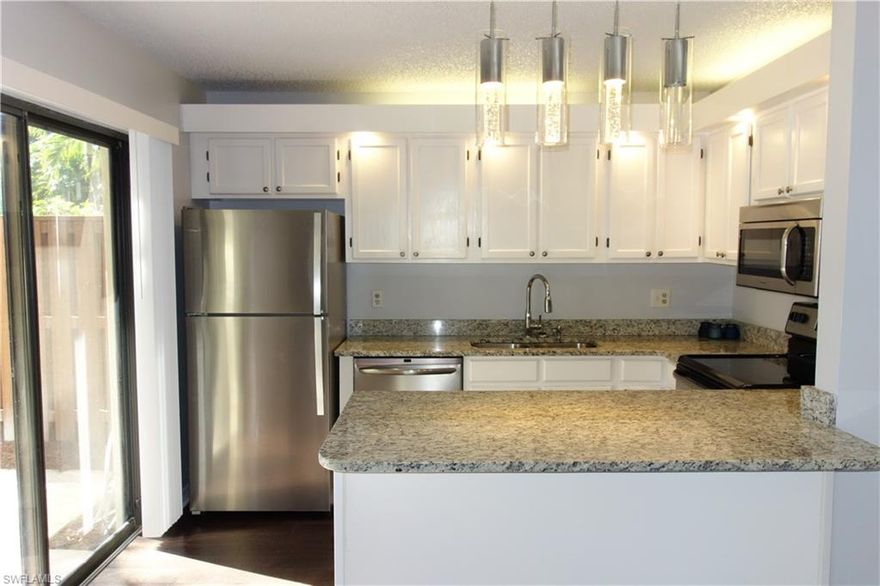 The Village of Cedarbend is a Well Kept, Beautifully Landscaped Townhouse Community That is Close to Everything! This 2 Bedroom, 2 Full Bath Unit Has Been Completely Remodeled! Everything is NEW! Hardwood Flooring Throughout the Downstairs, Tile in Both Baths, Brand New Carpets in The Bedrooms & Upstairs. Kitchen Has Been Upgraded with New Stainless Steel Appliances, Granite Countertops & Modern Light Fixtures. 2 Sets of Sliders that Lead out to a Private Fenced Courtyard. Community Features A Heated Swimming Pool and Trails for Walking and Biking. Water is Included and One Small Pet is Allowed. Conveniently located Closed to Airport, Sanibel and Fort Myers Beaches! This is the BEST Unit in Complex!