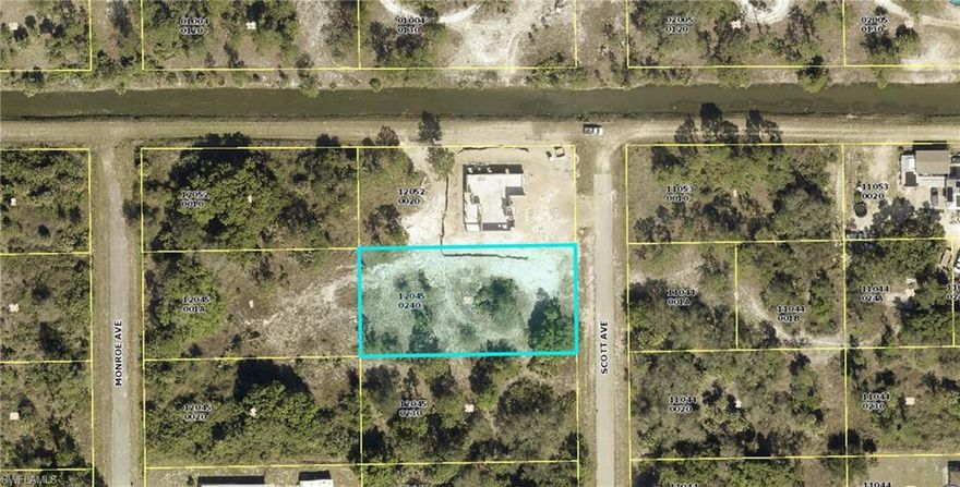 Half an acre Lot available for investment and start new construction. Centrally located in Lehigh Acres most desirable zone, lots of new construction around. BUILD YOUR DREAM HOME at this location.