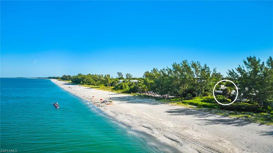 Tucked amidst swaying palm trees directly on Captiva Island’s world-famous beach, you’ll find this stunning Gulf-front home. The gorgeous interior paints an idyllic setting only surpassed by the amazing location. The stunning open kitchen features a large island with great seating and beautiful appointments all set next to impact-rated sliding glass doors where Gulf views abound. Enjoy a movie in the large living room or great conversation with friends in the fireside seating area, all with stunning views. The screened lanai off the main living area features an outdoor kitchen and both lounge seating and large table perfect for beachside meals. The primary bedroom features a fireplace and a beautifully appointed bathroom. Another large lanai is perfect for enjoying the views. Spend a day on the beach, walk or take a golf cart to restaurants, shops & enjoy the amazing amenities including a large pool, boat docks, tennis courts, and all of this is just steps from your front door.