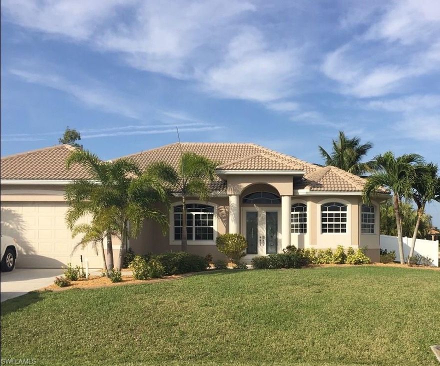 Beautiful custom Paul Home, in one of the most sought after neighborhoods in NW Cape. Lowest Priced Heated Pool and Spa Home of this quality, size and age! Inviting open floor plan with soaring ceiling and plenty of windows allowing lots of natural sun light. The kitchen has new stainless appliances, plenty of cabinets and large corian counter and bar. room to seat 6! Mastersuite offers sliders that lead to screened lanai and pool area. Master bath has expansive walk in shower, his and hers vanities as well as large soaking tub and 2 large walk in closets. There is tile throughout this beautifully designed home! Sliders off the living area leads to the pool deck and back yard. You'll love the new vinyl fenced yard for your privacy! New high efficiency AC, whole house RO, updates to many to list. 
Located just across from 7-acre Joe Stonis Park with Tennis, Pickle ball, Shuffleboard & Basketball courts, walking paths, fitness stations, 1-acre scenic lake, shaded playground, covered Picnic & BBQ areas - all just steps away. Burnt Store public boat ramp only 2 minutes away! A MUST SEE!!! Call today for your private showing before this is gone!