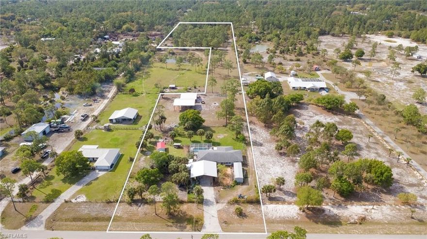 By Appointment Only! Rarely Available 3/2/2 Pool Home on 6.28 Acres in Alva. NOT located in a flood zone. Zoned Ag 2. Bring all your farm animals!!!  AC is 5 years old, roof is 6 years old. Whole house Reverse Osmosis system. 2 wells, 4 of the 6 acres are irrigated. 30 X 35 Barn Kit Carport in Front for outdoor living and extra car/toy parking. 40 x 45 14 foot tall Barn kit (Tall enough for your RV)  in back next to a 3 stall barn with tack room, cement floor and storage area.  2 11ft X 19ft Metal Sheds 2 RV hook ups 1 30 amp and 1 50 amp. Fruit trees throughout the property including Mulberries, Barbados Cherries, Ice Cream Bean, Peach, Bananas, Mangos, Cocoplum, Seagrape, Olives, Citrus & Tamarind. 3 Large raised bed gardens. Large Custom built chicken coop, 2 metal sheds with electric. Property is fenced and cross fenced with gates to access each area or leave it all open. Reenforced road to the back allowing heavy vehicles to drive to the back of the property without getting stuck. Generator switch on breaker box to easily plug in when electric goes out. Whole house power surge protector. Pool Shower. ***Property Monitored With Surveillance Cameras**