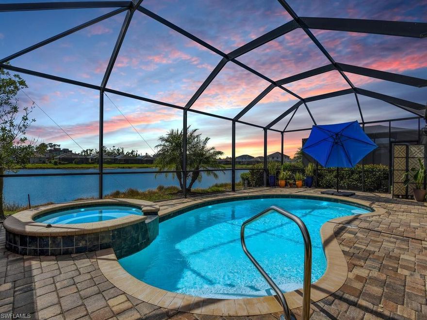 Stunning SOUTHERN EXPOSURE saltwater  pool home w/ luxury features throughout! This lakefront single family home was built in 2018 and has been GENTLY lived in. You will love the outdoor living space which features a peaceful view of the lake,  heated salt water  pool & spa, extended pool deck w/ pavers, long covered area  and extra awnings that provide additional shade on lanai if desired. Sellers installed IMPACT WINDOWS. The solar panels offer energy savings for a low cost to lease. Inside you will find a comfortable great room layout, tile flooring throughout, custom mirror on wall accented w/ wood details in dining area, open concept kitchen w/ island & walk-in pantry, den w/ French door entry, guest en-suite, designer light fixtures & fans, and crown molding. This home had zero water intrusion in Ian. Situated in an up & coming gated community w/ a highly desired S Fort Myers location- short drive to Lakes Park (bike/jog/walking trails canoe/kayak, picnic areas, & more), public library, lots of shopping/dining options, and easy access to Estero Island (Ft. Myers Beach) and to Sanibel/Captiva.
