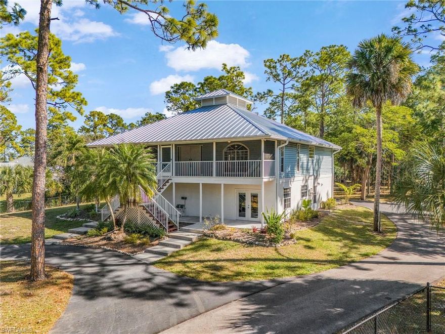 Custom-built Florida-style home tucked away in a prime close-in Golden Gate Estates location. Set on 2.5 beautifully landscaped acres, this charming property offers exceptional space, privacy, and versatility. The main residence features 3 bedrooms, 2 bathrooms, a spacious living and dining area, and an upstairs flex room ideal as an exercise room or sunroom.

The first floor includes a completely separate, self-contained 2-bedroom, 2-bath guest suite with its own private entrance and no interior access to the main home—perfect for extended family, guests, or income-producing opportunities such as long-term rental or Airbnb (subject to local regulations).

Pride of ownership is evident throughout. Meticulously maintained and thoughtfully upgraded the home with wood and tile flooring, granite countertops, new metal roof (2024), new pool (2021), new ACs (2023), and much more.  

The **oversized 3-car garage** includes an additional room ideal for an office or workshop. Outside, the property offers abundant parking, a **beautiful circular driveway**, and lush surroundings that enhance the home’s private, estate-like feel.

A rare opportunity to own a spacious, well-built, and highly flexible property in one of Naples’ most desirable acreage communities.