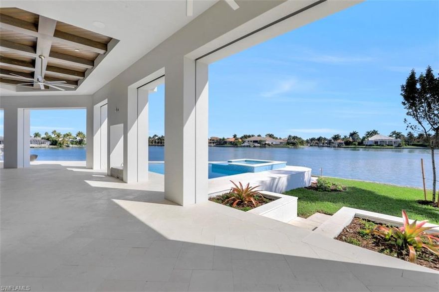 BRAND NEW CONSTRUCTION! built by AQUA Custom homes- Located in the preferred SOUTH END of the island super close to the beach and all the shops, restaurants, mini golf and more!! But really its all about the WIDE WATER 180 degree Bay views of Smokehouse Creek! Plenty of seawall for all your water toys.. This open plan features 5 BEDROOMS Each with their own bathroom. a study, pool bath, Loft & additional storage! All finished in Soft Coastal Greys and whites- Dining and Study have Walnut beam ceiling accents. Fabulous Kitchen with oversized Island! Gas cooktop, walk in pantry, custom stainless hood and glass tile subway splash. Youll want to spend a lot of time outside when you see the Huge Outdoor covered lanai space with walk behind bar, built in grill, & under counter fridge. Gas see thru fire place, Fire bowl & motorized roll down SCREENS & SHUTTERS. Back inside a custom stair case takes you to the second floor loft, 3 of the 5 bedrooms a wet bar and a large balcony overlooking the bay!