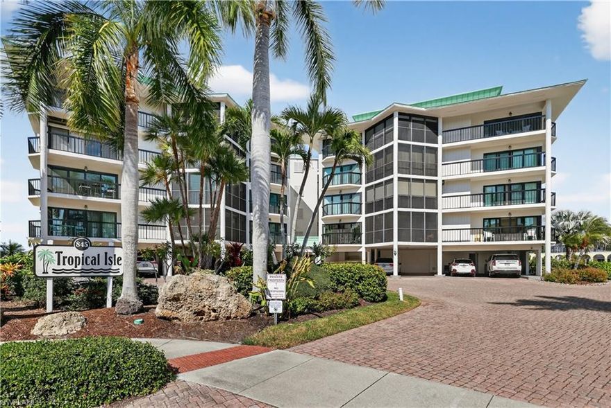 MARCO ISLAND "SALT-LIFE" BEACH-BOATING-FISHING-SUNSHINE & UPSCALE ISLAND LIFESTYLE!  STUNNING  DECORATOR REMODELED ($300,000+/-) 3 BEDROOM, 2 BATH, W/PRIVATE DEEDED BOAT DOCK (24) & UNDERCOVER PARKING! OPEN WATER IS LITERALLY OUT IN 5 MINUTES TO OPEN WATER.  Big OPEN FLOOR PLAN, all "Wood Plank" Cortex Vinyl flooring in halls, living room, 3rd bedroom, kitchen and carpeting in Master and guest bedrooms. All "IMPACT" STORM RESISTANT WINDOWS & SLIDERS, for total storm protection and comfort and all windows with ELECTRIC CONTROLLED BLINDS. "CHEFS" completely new remodeled kitchen: Custom Wood Cabinets, Level 5 Granite Tops, All Samsung High End Stainless Steel Appliances, Tile Backsplash and (2) Separate Eat-At-Counters for family kitchen gathering. Lanai is completely enclosed, tiled and A/C. ALL ASSESSMENTS ARE PAID, ALL "SIRS" ENGINEERING OF BUILDING ARE COMPLETED WITH FLYING COLORS (2025), BUILDING ALSO HAS A NEW ROOF AND NEWER DOCKS AND SEAWALL. South end of the Island is "best in location" with low traffic, close to all the best restaurants, shopping, entertainment and for boating and fishing, out in minutes. HOME COMES WITH ONE YEAR "HOME WARRANTY" FOR TOTAL BUYER COMFORT. This Condo Home is a "Premier Group" BEST VALUE WATERFRONT CONDO BUY!
