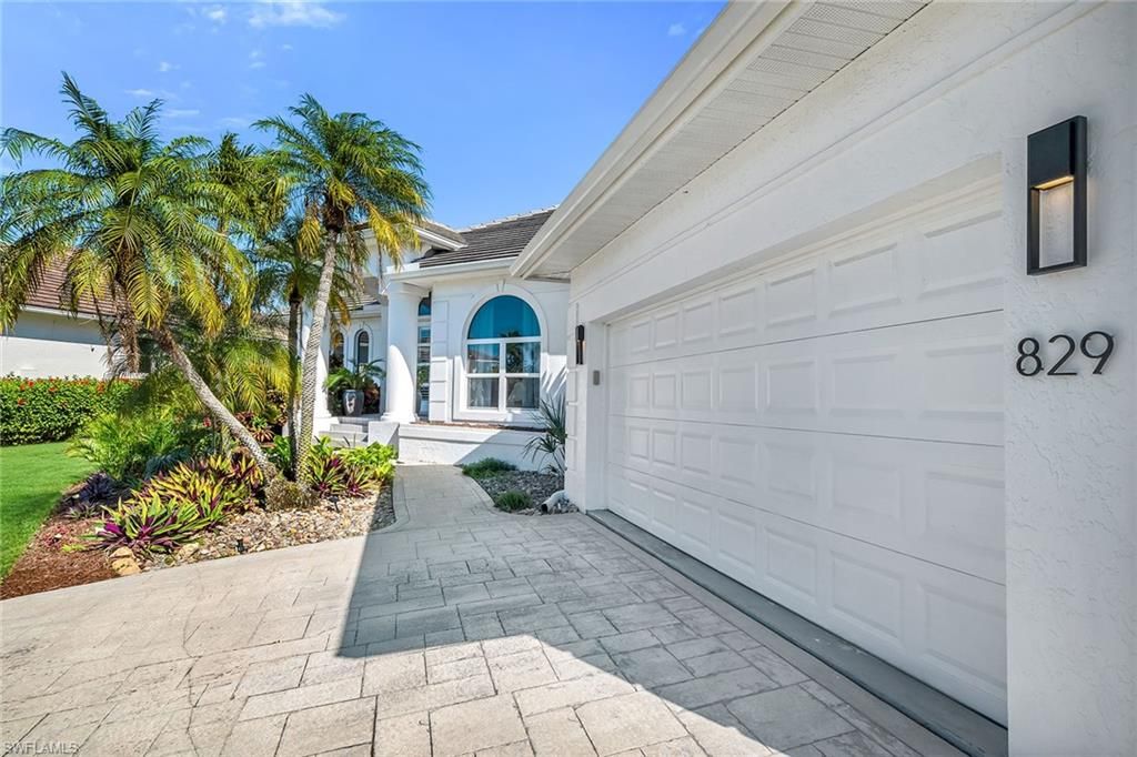 Photo of 829 Bluebonnet CT, MARCO ISLAND, FL 34145 (MLS # 226005275)