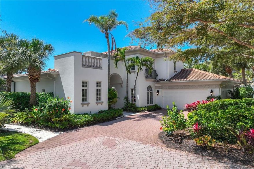 Welcome to Las Palmas in The Colony Golf and Bay Club, a quaint enclave of single-family homes nestled among Italian fountains, brick paved roads, and beautiful lush landscaping and trees. Nicely positioned on a private lot in a quiet cul-de-sac is this beautiful 2-story, 3+den, 3.5 bath Mediterranean style home that is sure to mesmerize and captivate you with its attention to detail and architecture. Upon entering the 10ft solid Mahogany front door, you are greeted by an inviting entry way with soaring ceilings and a home that exudes old world charm. The main level of this luxury residence encompasses a formal living room surrounded with large glass door windows, formal dining room, powder room, an open concept family room, casual dining room, and gorgeous fully equipped Chef’s dream Kitchen complete with a gas cooktop, stainless steel appliances, granite counter tops, desk, and bar seating center island, perfect for entertaining family & friends. The spacious master suite is truly a relaxing private retreat that boasts large picture-perfect windows and sliding glass doors leading to the tranquil lanai, and a private ensuite bath with his and her vanities, soaking tub and large walk-in shower. The Den with desk features a quiet space to get some work done or just simply relax and read a book. Upstairs allows privacy for your guests including 2 bedrooms with ensuite bathrooms and large loft with a sofa & TV, perfect for family movie nights. One of the best features of this home is the large screened in lanai with gas heated pool with tanning ledge and spa, overlooking the green landscape on to a serene lake, making for the ultimate private oasis. Please note: Garage is not available for parking. 
The Colony is a prestigious gated community located within Pelican Landing, a 2,365-acre gated community dedicated to preserving, protecting and enhancing the natural environment. Community amenities include a boat shuttle that provides transportation to and from a 34-acre gulf island Beach Park located at the northern tip of Big Hickory Island. Beach Park facilities include an elevated beach house with open decks, restrooms, shower facilities, nature library, beach bocce courts, open and screened picnic pavilions, beach chairs and umbrellas. The Community Center offers endless social activities and features a state-of-the-art 3,200 sq. ft. fitness center and 1,200 sq. ft. aerobics room. The Tennis Center has 12 har-tru courts (7 lighted) and a pro shop. Residents can enjoy private or group lessons or participate in one of the many scheduled events. Canoes and kayaks are available for residents use on Spring Creek, a tributary of Estero Bay, and Coconut Point Marina, which gives access to Estero Bay, Mound Key and the beaches.
Bay Club membership is available!  Reserved exclusively for the dining enjoyment of The Colony residents and their guests