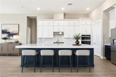 Photo of 8529 Oceana WAY, NAPLES, FL 34114 (MLS # 226023679)