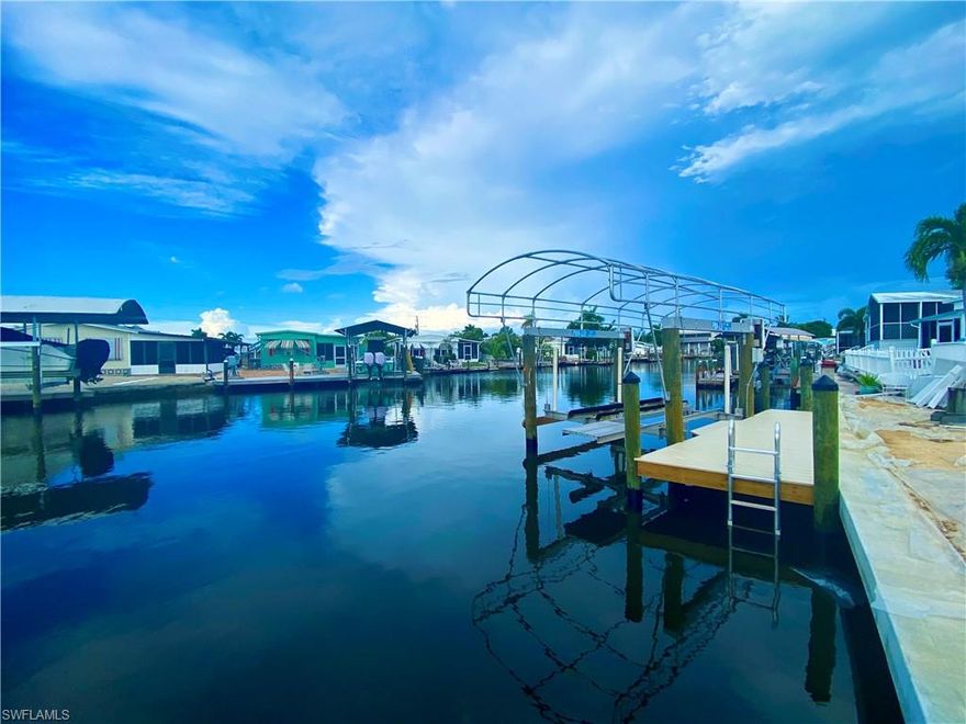 Discover the more Affordable Waterfront Lifestyle of Saint James City Florida! You''ll LOVE this Cute Tropical Lifestyle for the Real Boater and Fishermen at heart ! BRAND NEW DOCK, BOAT LIFT and SEA WALL!  This is a HUGE UPGRADE to the next home owner! Welcome to your new seasonal or full time residence in Paradise! This home features 2 Bedrooms, 2 Baths , a Home Office / Den / Lounge Area, Large Over Sized Concrete Deck for Viewing Sunsets! Plus a Nice Screened Lanai for rainy Summer Days!! The home has a BRAND NEW METAL ROOF some newer appliances and a newer water heater. The home is being offered FULLY FURNISHED, TURN KEY and the boat could be included with a reasonable offer! Island life is here waiting for You, just bring your Tooth Brush ! Call today to schedule your own personal showing. 12 MONTH HOME WARRANTY INCLUDED!
