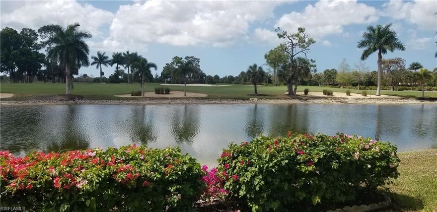 Royal Wood Golf Club-First floor turnkey  retreat with golf and lake view offering exquisite sunsets from your private lanai. 2BR,2BA and roomy den.  Updated kitchen with real wood cabinets and granite counter. Newer laminate flooring in living room and dining room.Newer washer and dryer in large laundry room that has extra cabinets. Hot water heater 2018. One car garage. Electric storm shutters.  Heated pool is right outside the door along with spa and tennis court that has pickle ball lines. Club is in process of a multi million  dollar renovation that is going to make living here even better with new fitness center, pro shop, library and expanded clubhouse and renovated restaurant. Lot of social events throughout the year giving you the opportunity to meet new friends and enjoy the Florida lifestyle.  Beautiful downtown Naples with shopping, restaurants and the beach is just a short drive.  Buy now and winter will never be the same!