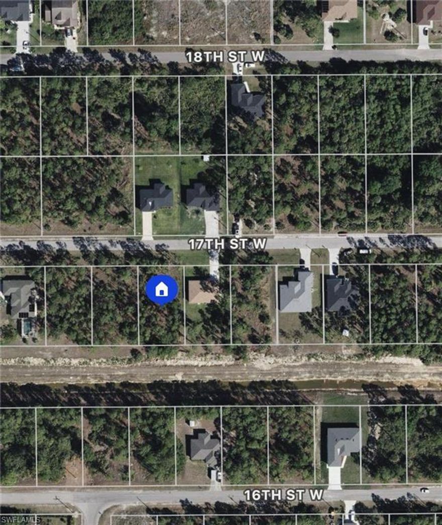 Incredible opportunity to own in the most developed section of Lehigh Acres. Surrounded by new construction homes on a paved road with electric at the curb. Easy access to Lee Blvd! Buy and hold or develop and yield returns. Hablo Espanol