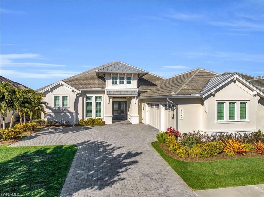 This Stock Built Home Madison II has so much to offer.   Water views in both the front and the back, wonderful ceiling detail in almost every room, tasteful selections that make it easy for the buyer to make it their own. Built-in outdoor kitchen, upgraded pool equipment, a whole house generator, Storm Smart Shades, AC for the garage with insulated garage doors, decorator lights and fans, additional landscaping and so much more! When you walk in you will see the care that was taken in designing this home and you will want to move right in! The lanai is oversized with a lake view you will want to admire daily.   The Isles of Collier Preserve is a resort community ideal for an active lifestyle with state-of-the-art fitness center, lap pool, tennis, pickleball, kayaking and trails for biking, walking and daily bird watching. The on-site restaurant makes it easy to enjoy lunch poolside or an island-style dinner from the lakeside Overlook Bar & Grill. Near 5th Ave with its world-renowned dining and shops!