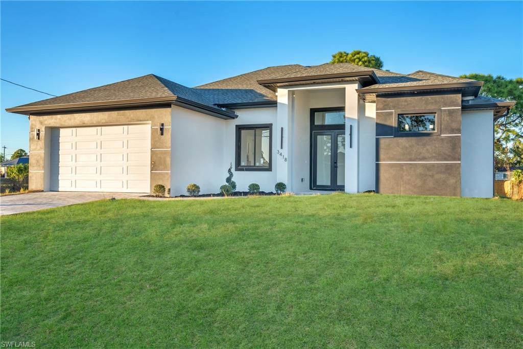 Photo of 3418 8th ST SW, LEHIGH ACRES, FL 33976 (MLS # 226005642)