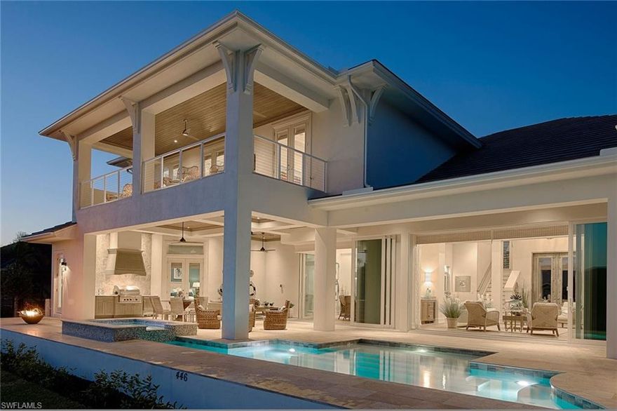 Brand-new custom-built Divco home located on an extraordinary water-direct lot with southwest exposure and fast, easy access to the Gulf of Mexico through beautiful Collier Bay. This gorgeous 4-bedroom, 4-½-bath 2-story residence has many exquisite details throughout. This home has it all with a large open great room, den, 2nd-floor loft, private balcony, exercise room, 2 laundry rooms, gourmet kitchen, breakfast bar, wet bar, walk-in pantry, upgraded appliances, custom cabinetry, tray and coffered ceilings, crown molding, wood and tile floors, 500-gallon gas tank, 2 tankless water heaters, impact-resistant glass windows and doors, 2 gas fireplaces, elevator, one and two-car over-sized garages set up for electric vehicles and a circular drive. All en-suite bedrooms with the master and guest bedroom on the 1st floor. 2 more bedrooms on the 2nd floor. The spacious sweeping veranda is outdoor living at its finest and is the perfect place for entertainment or relaxation and comes with a gas-heated pool and spa, outdoor kitchen, outdoor shower, electric roll-down screens, water feature and 2nd gas fireplace. New seawall 2021. This is what luxurious coastal living is all about.