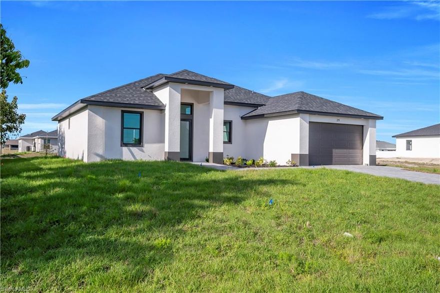 Welcome to this stunning new construction home in the heart of Cape Coral! Ideally located and connected to city water and sewer, this move-in-ready residence offers 3 spacious bedrooms and 2 bathrooms, showcasing clean, modern finishes throughout. Situated in a non-flood zone, this home provides both peace of mind and exceptional convenience.