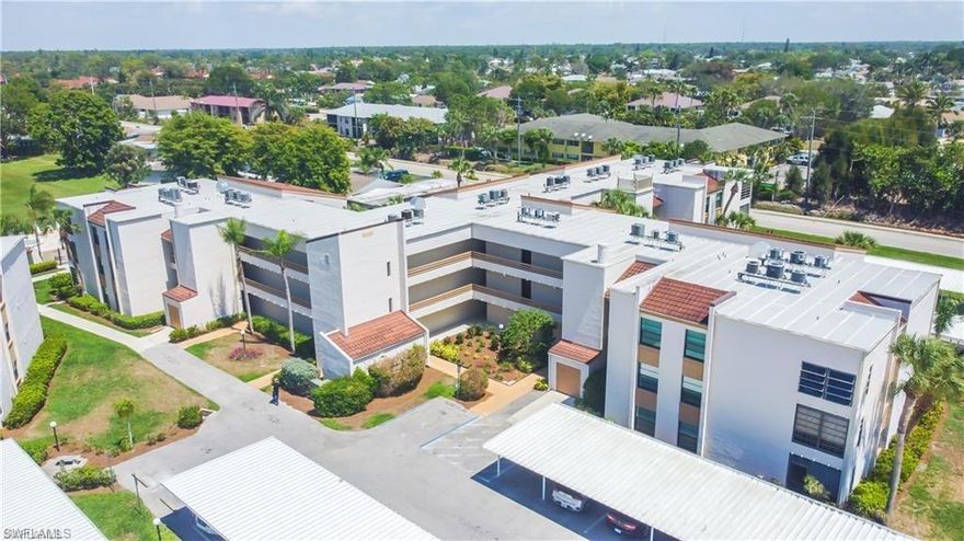 Introducing a turn-key furnished one-bedroom, one-bathroom condo conveniently located just 3.5 miles from Fifth Ave South in sunny Naples, FL! This ground-floor unit showcases laminate wood-style flooring, stylish white shaker cabinets, stone countertops, and a lanai. The bedroom boasts generous closet space, an updated bathroom with a walk-in shower and new vanity. Additionally, a washer/dryer is conveniently situated in the kitchen area. Each unit also includes a designated carport parking space and an external storage area on the same floor.
