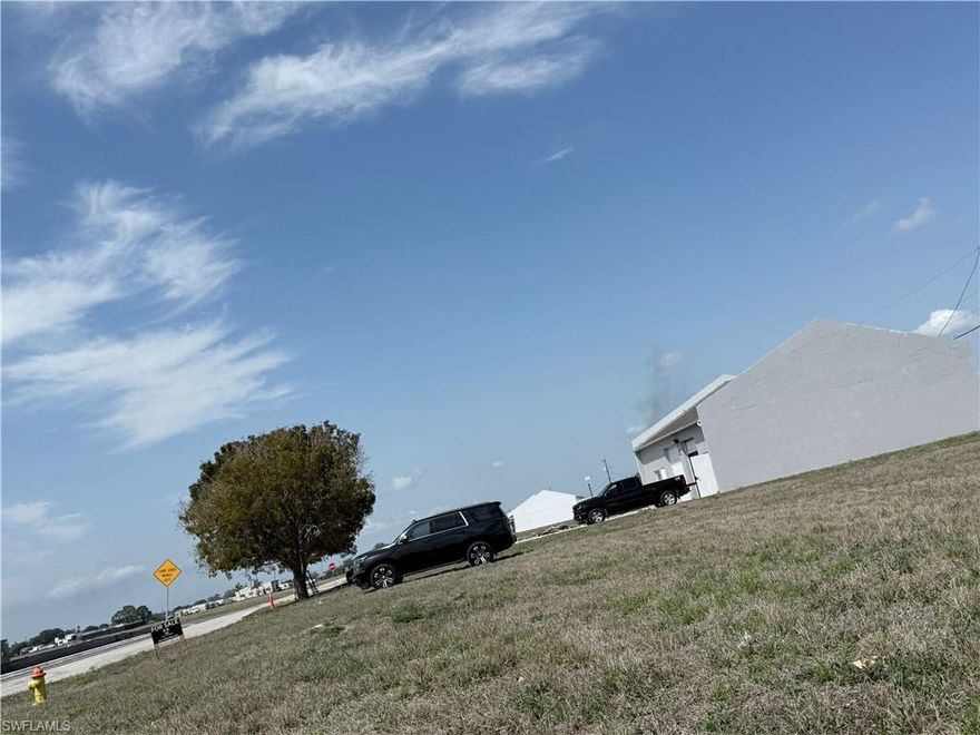 Prime 25x125 commercial lot situated on a paved city road in Cape Coral, located in a high-profile, fast-growing commercial corridor. With city water and sewer already available, this property is perfectly positioned for new development or long-term investment. Surrounded by ongoing growth and increasing traffic, this is an ideal location to establish your business or expand your portfolio.